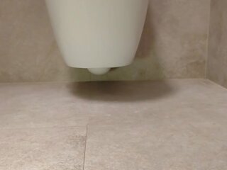 Alluring feet in the toilet